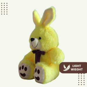 Adorable yellow rabbit plushie with fluffy tail