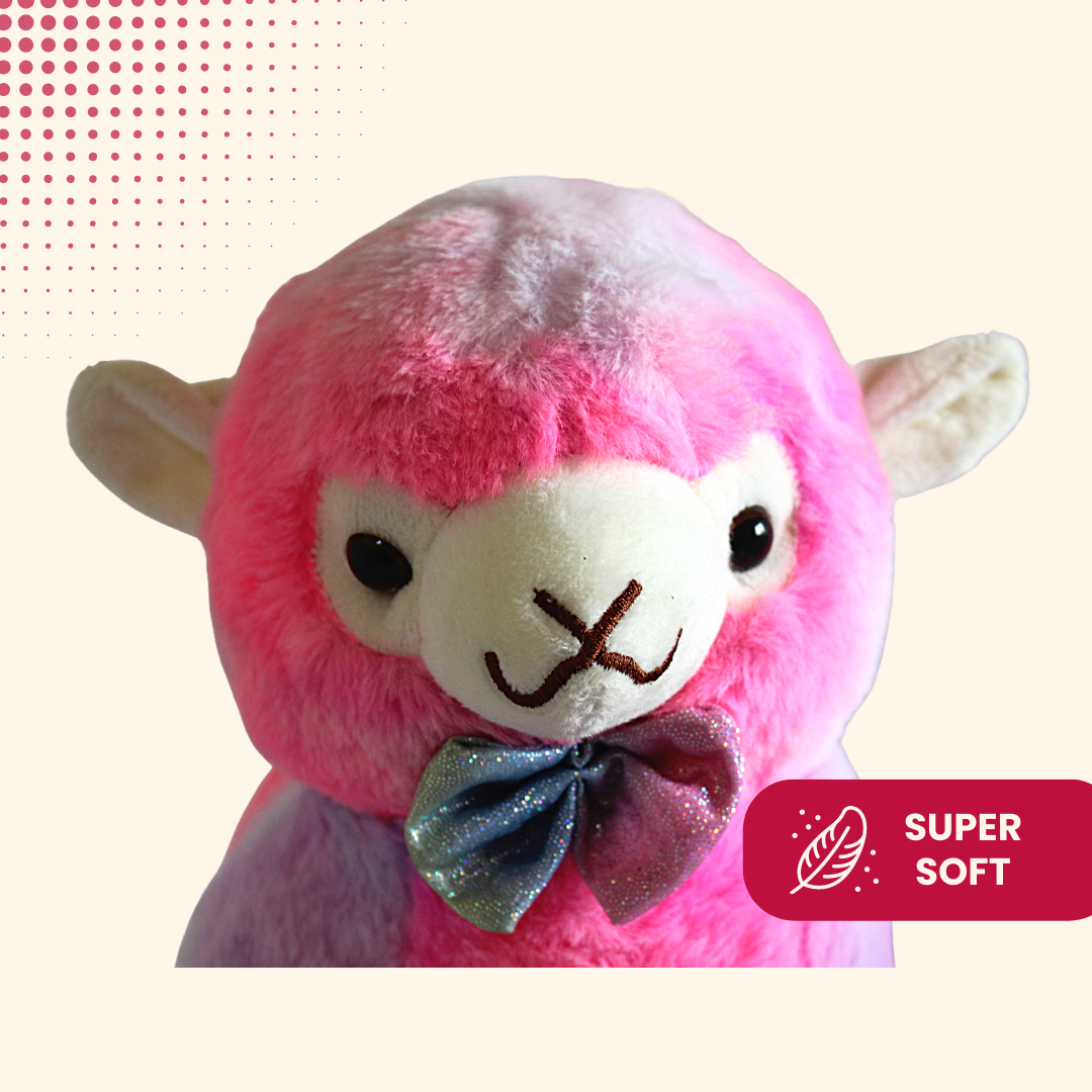 Small purple llama stuffed animal on a white background