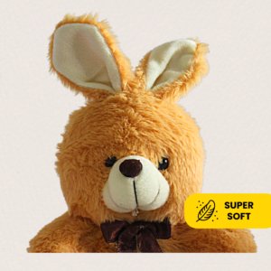 Cuddly brown-colored bunny plushie with a fluffy tail